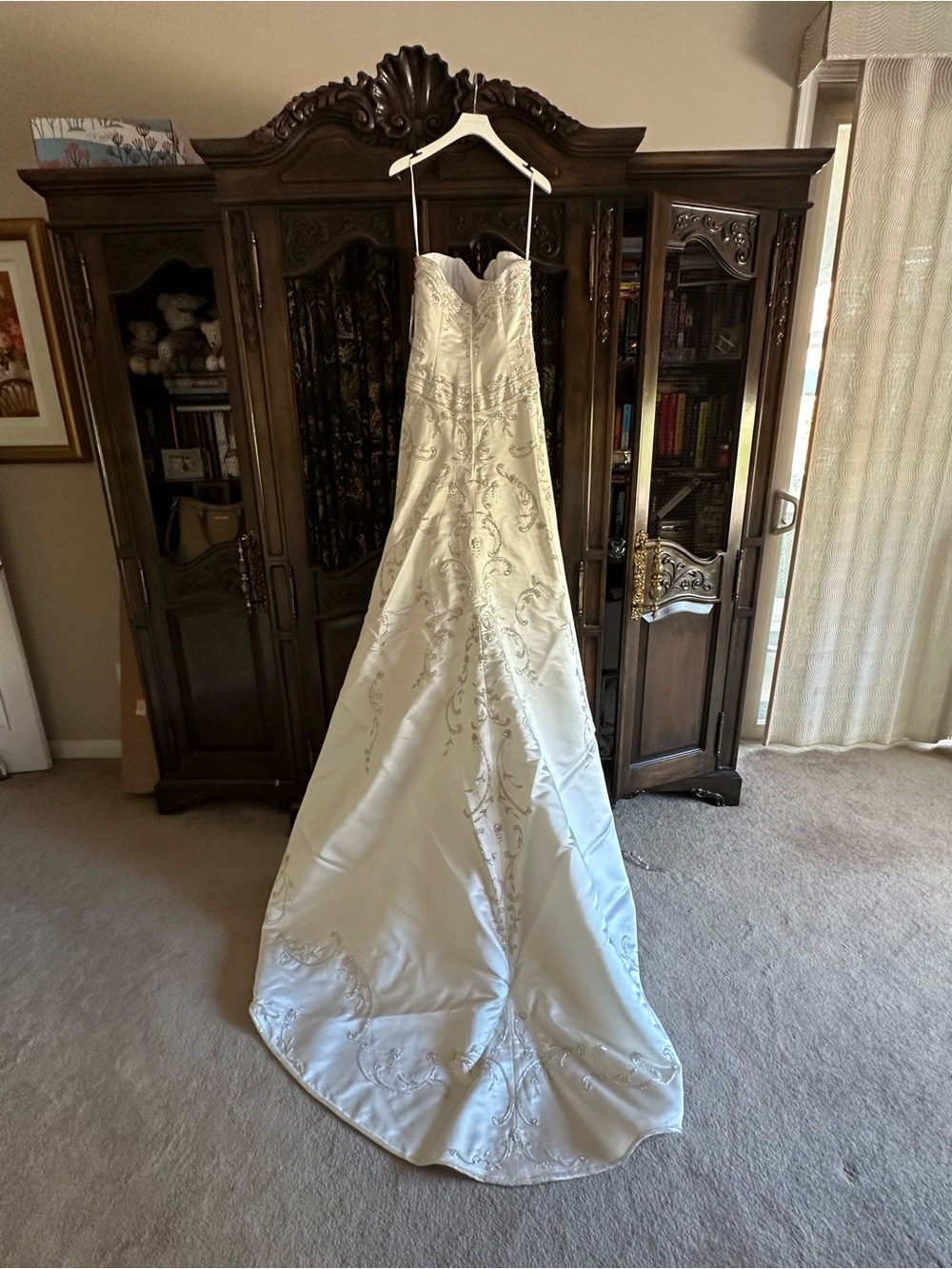 Elegant Strapless Ivory Satin Wedding Gown with Embroidered Detail
